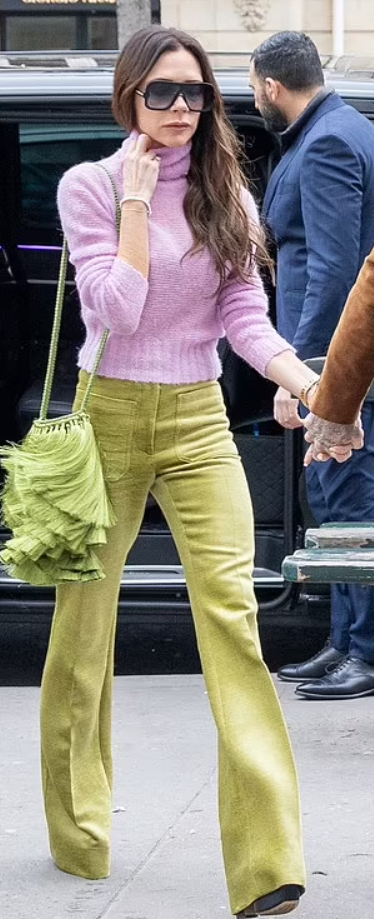 Who made Victoria Beckham's green pants, purple turtleneck sweater, and  sunglasses? – OutfitID